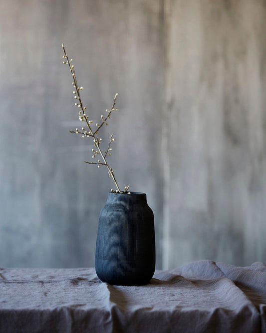 black etched vase.